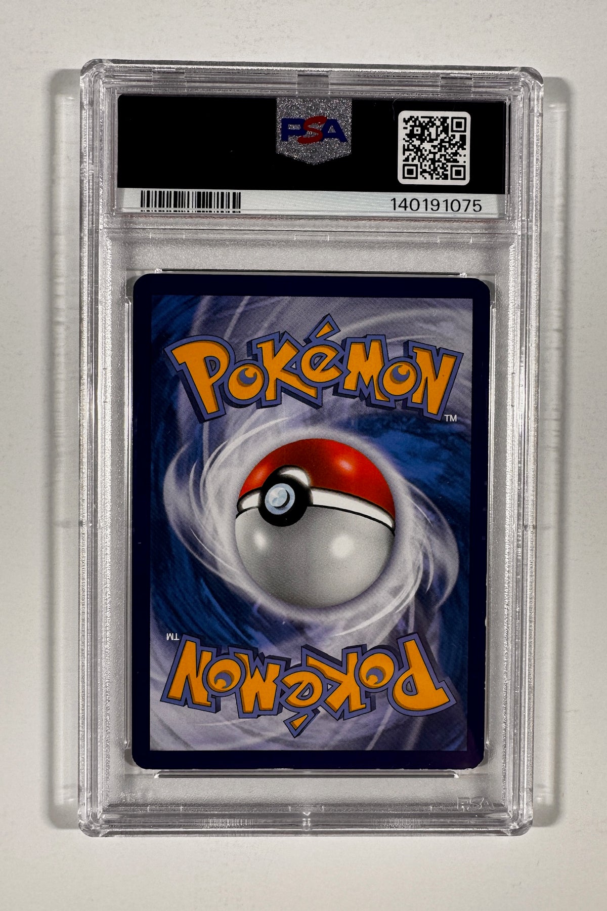 Back of PSA graded slab displaying Pokemon card back and PSA certification QR code.