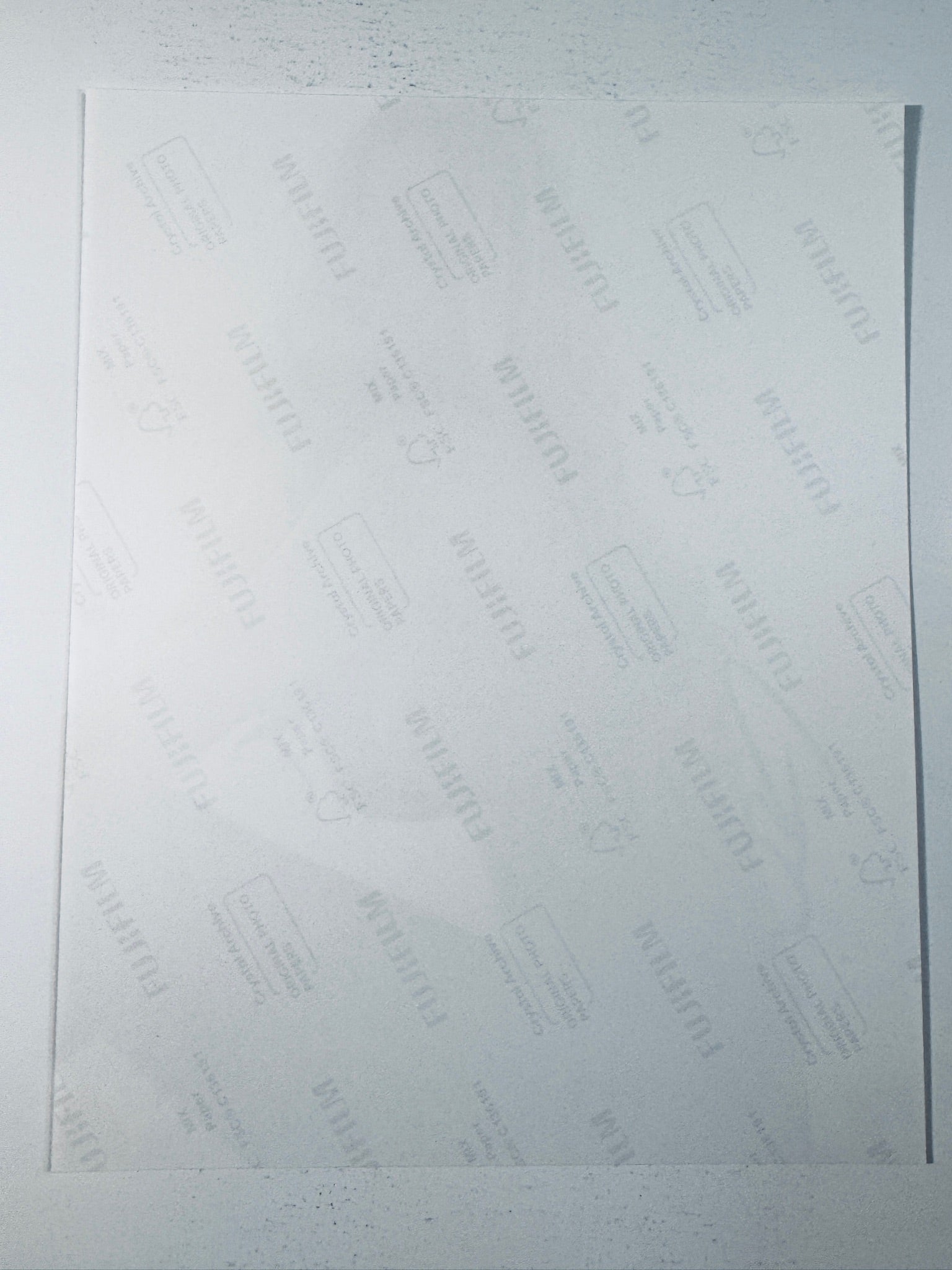 Fujifilm Crystal Archive photographic paper back surface showing the authentic backing and matte paper texture for the Brooklyn Decker signed photo.