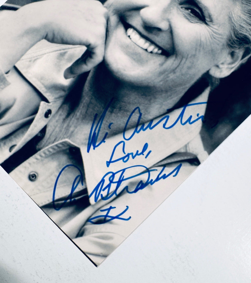 Close-up view of the blue ink personalized signature and inscription on an authentic Ann B. Davis signed photo.