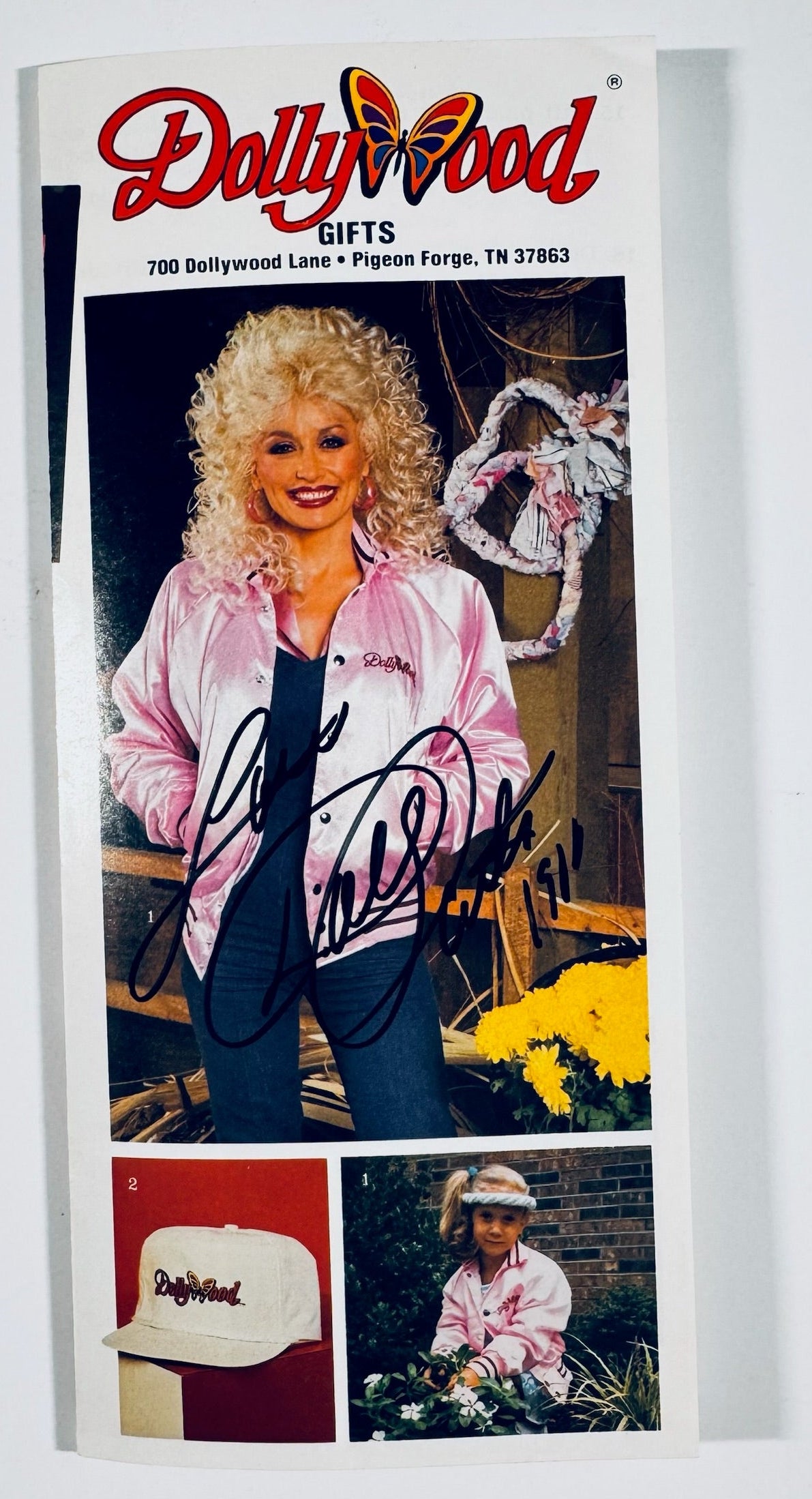 Autographed vintage Dollywood Gifts catalog front cover signed by Dolly Parton in black marker.