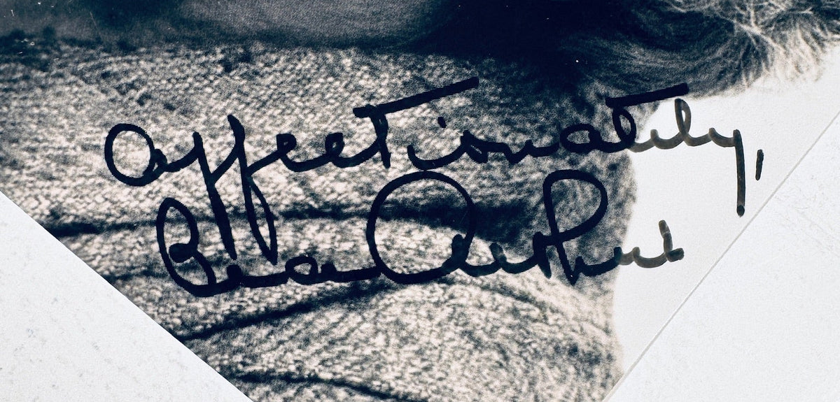 Close-up detailed view of an authentic hand-written black marker signature inscription reading "Affectionately, Bea Arthur" on a vintage black and white photograph.