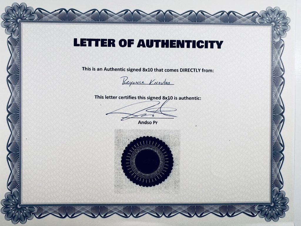 A Letter of Authenticity with a decorative blue-patterned border, certifying an authentic signed 8x10 coming directly from Beyoncé Knowles, featuring a signature and a dark circular seal graphic at the bottom.