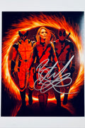Signed 8x10 matte photo featuring Blake Lively as Lady Deadpool flanked by Wolverine and Deadpool against a fiery portal background, with a bold silver ink autograph by Blake Lively.