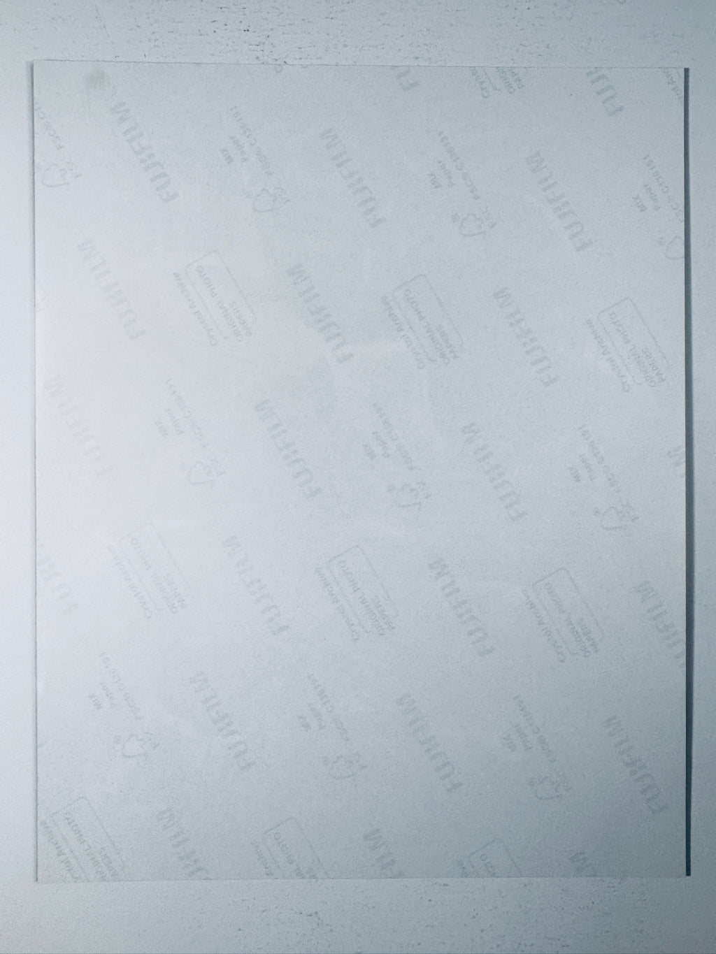 Back of the Fujifilm photographic paper showing the reverse side condition and paper branding for the Bo Nix signed Denver Broncos collectible.