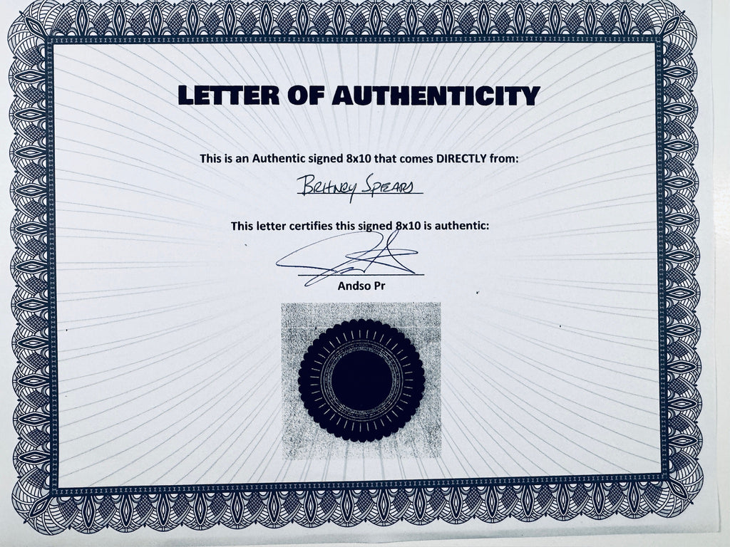 A Letter of Authenticity with a decorative blue-patterned border, certifying an authentic signed 8x10 coming directly from Britney Spears, featuring a dark circular seal graphic at the bottom.