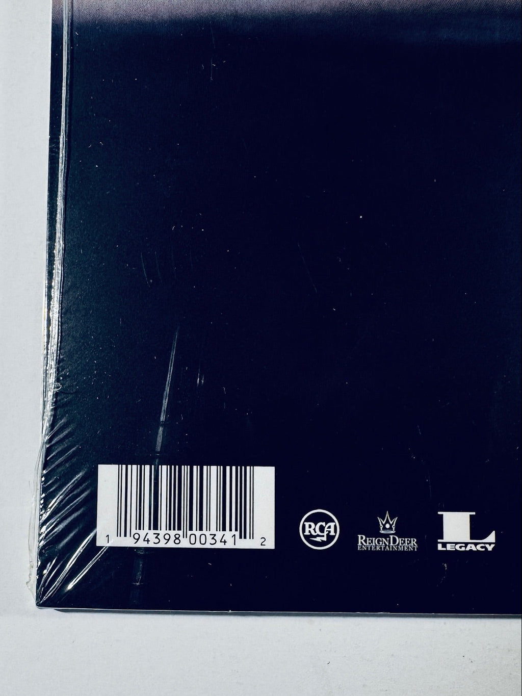 Close-up of the UPC barcode 194398003412 on the Britney Spears Britney Jean vinyl LP.