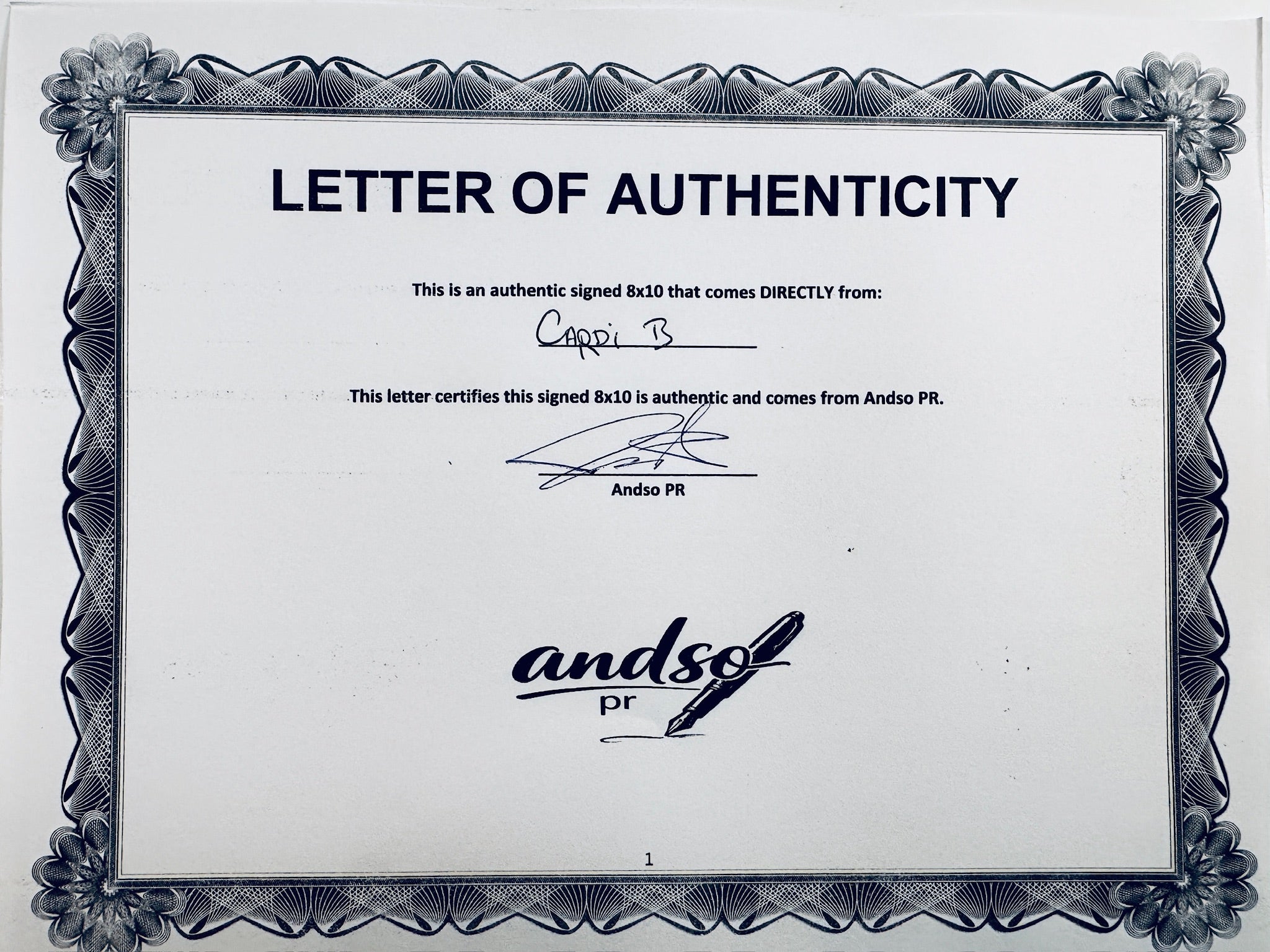 A Letter of Authenticity with a decorative blue-patterned border, certifying an authentic signed 8x10 coming directly from Cardi B, featuring a signature and a dark circular seal graphic at the bottom.