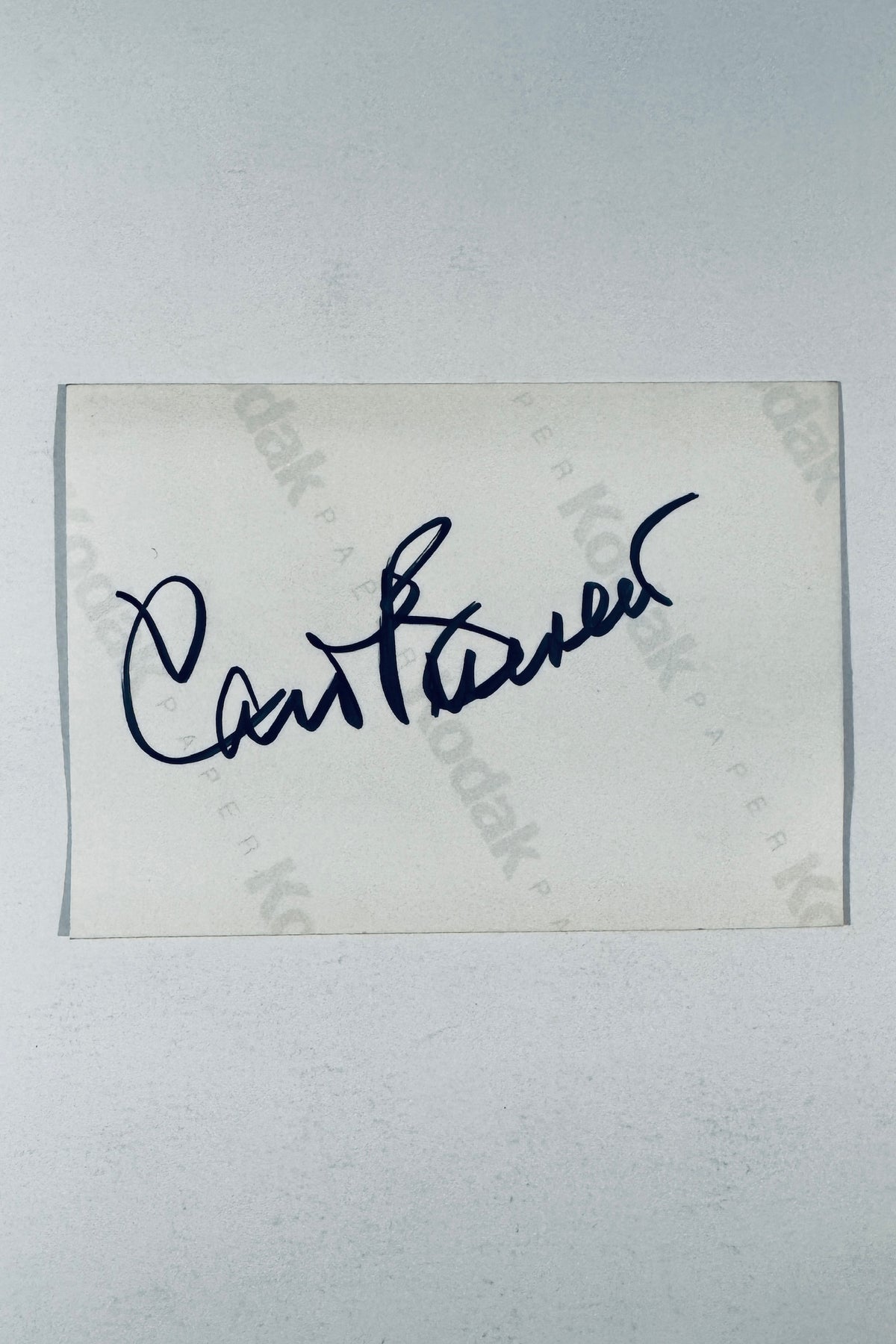 Full back view of vintage photo card featuring Carol Burnett hand signature in black marker on Kodak paper.