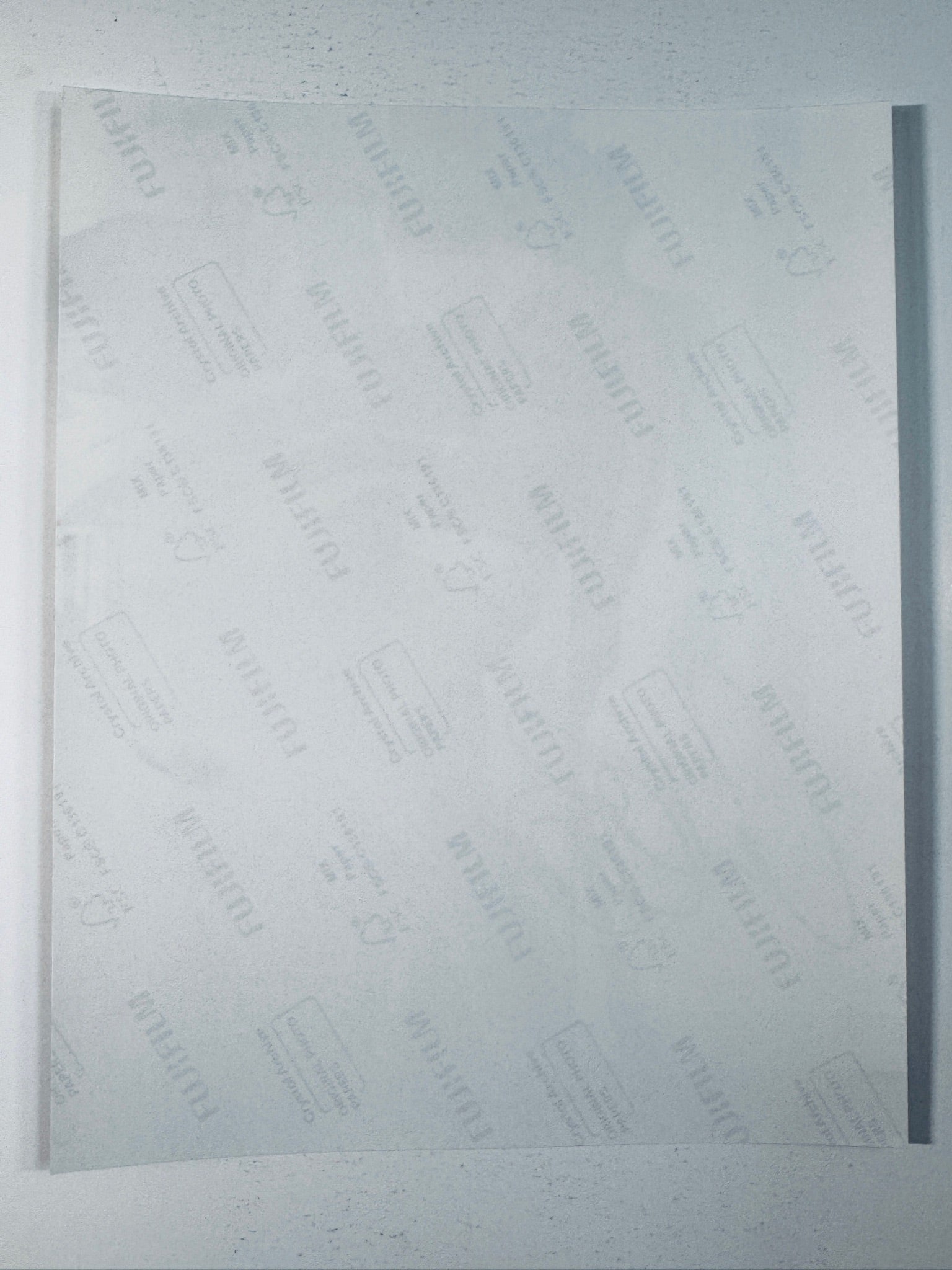 Back of the Fujifilm photographic paper showing the reverse side condition and paper branding for the Catherine Bell signed collectible.
