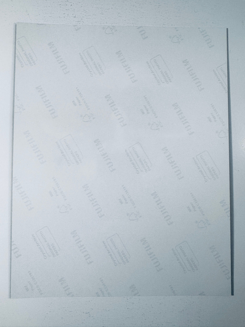 Back of the Fujifilm photographic paper showing the reverse side condition and paper branding for the Charlie Hunnam signed Sons of Anarchy collectible.