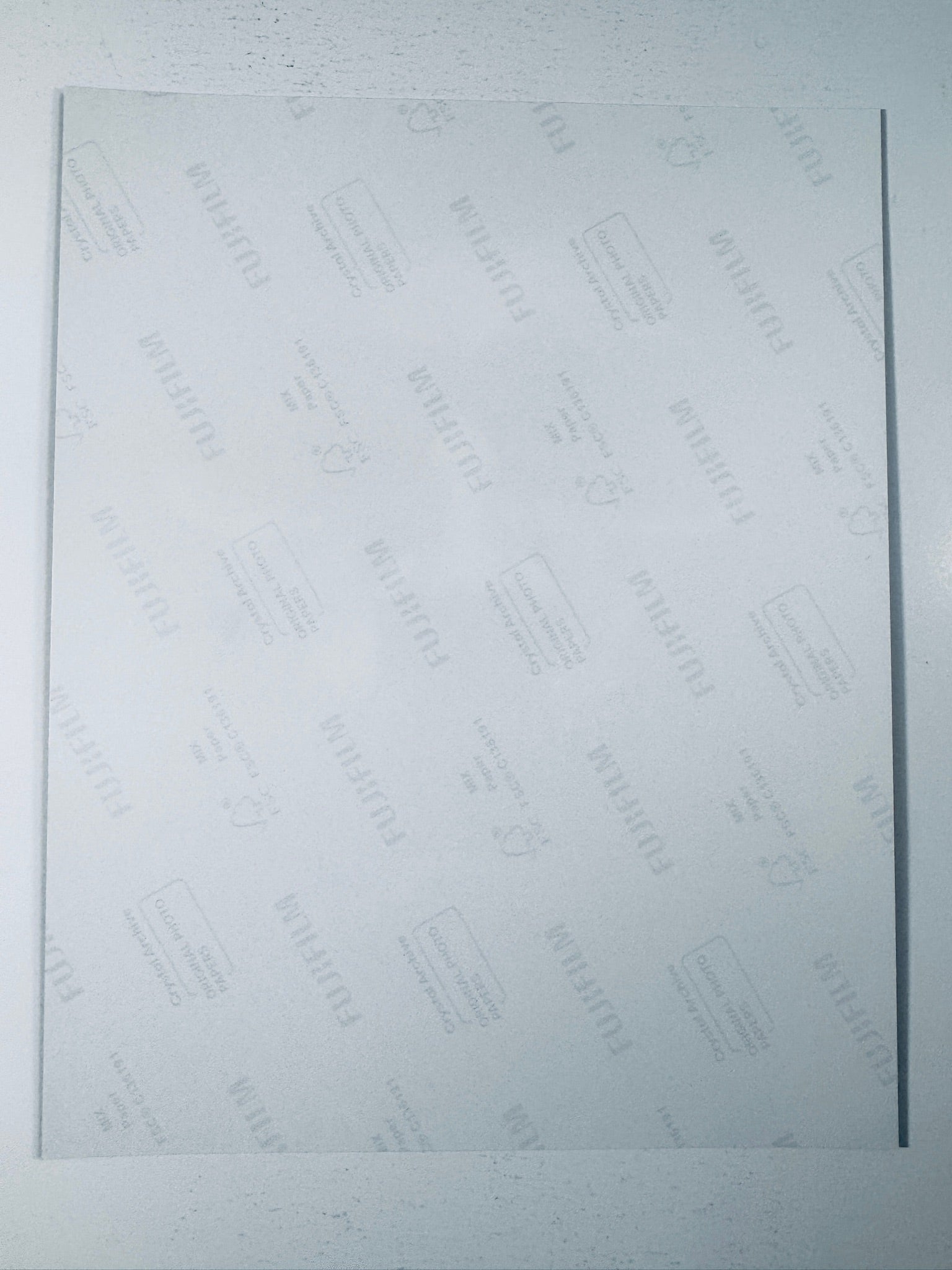 Back of the Fujifilm photographic paper showing the reverse side condition and paper branding for the Charlie Hunnam signed Sons of Anarchy collectible.