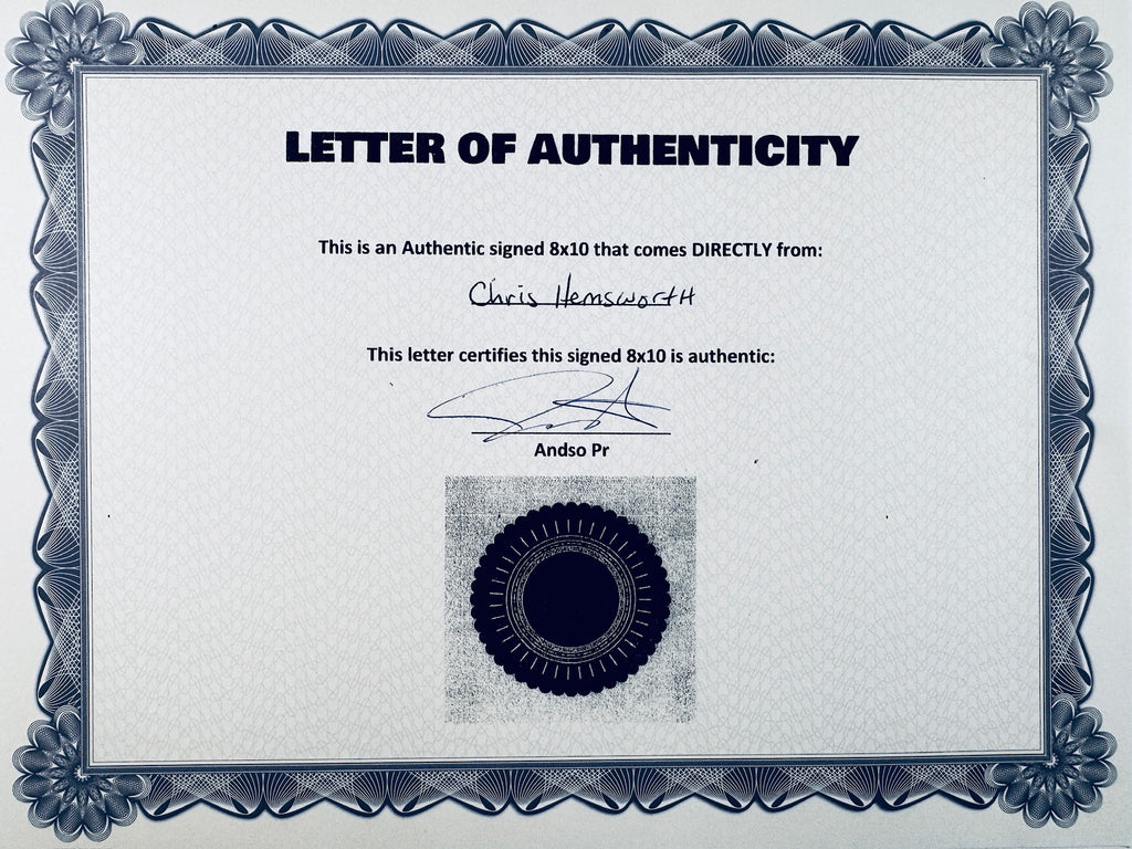 A Certificate of Authenticity featuring a decorative blue-patterned border, text certifying an authentic signed 8x10 from Chris Hemsworth, a signature, and a dark circular seal graphic at the bottom center.