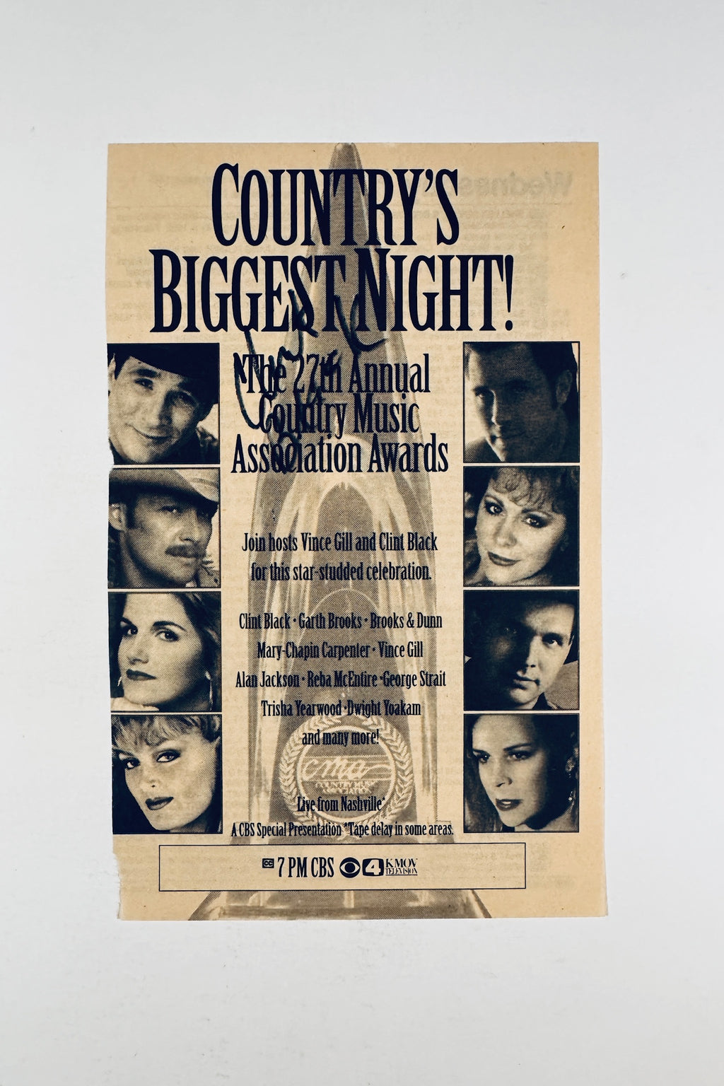 Full front view of 1993 CMA Awards TV Guide clipping hand-signed by Clint Black in black marker.