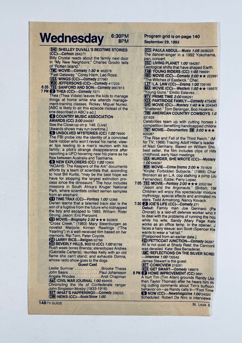 Full back view of TV Guide program grid page dated Wednesday, September 29, 1993.