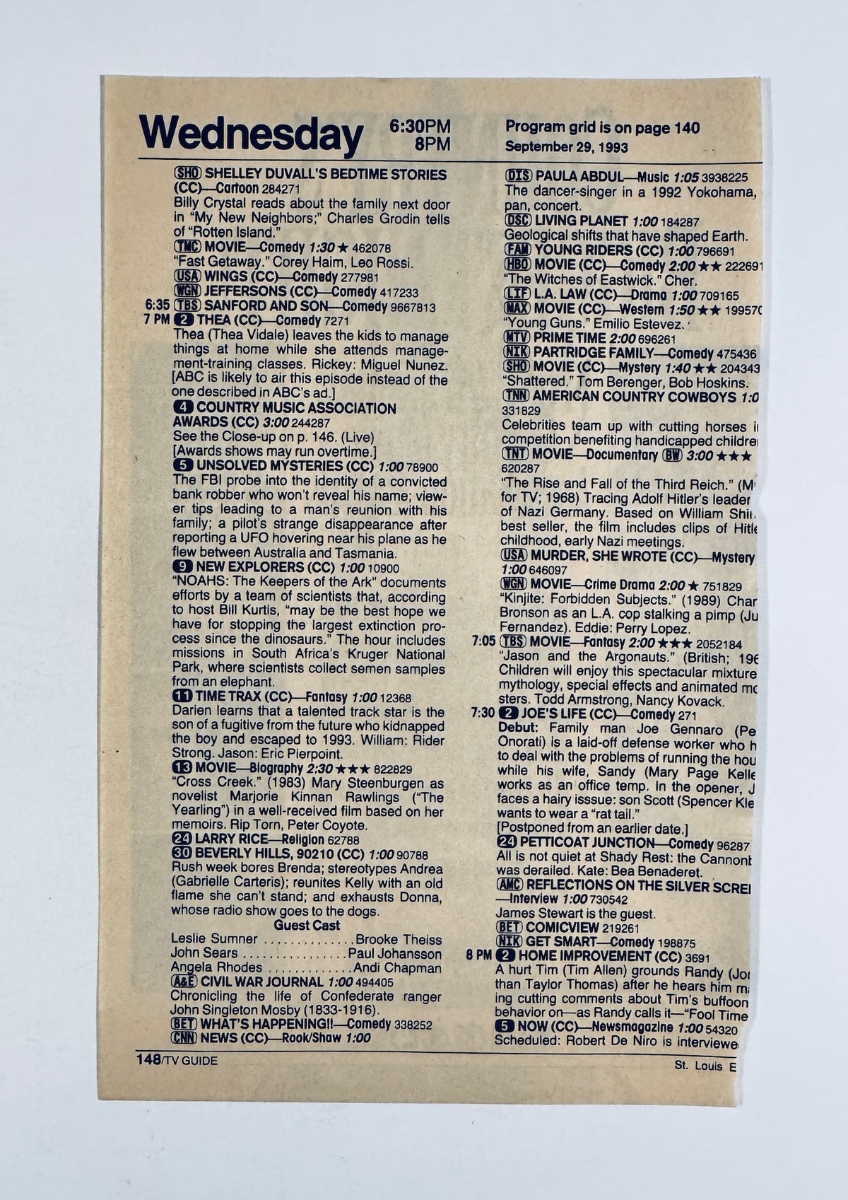 Full back view of TV Guide program grid page dated Wednesday, September 29, 1993.