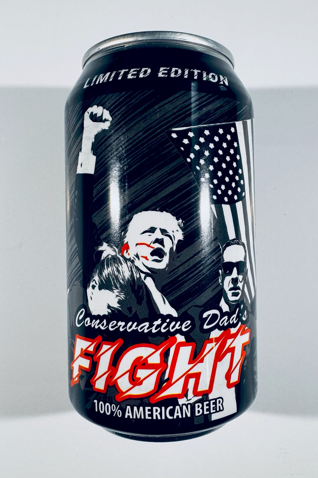 A limited edition aluminum beer can with a black label featuring white and red graphics, including an American flag, portraits, and the text 'Conservative Dad's FIGHT 100% American Beer'.
