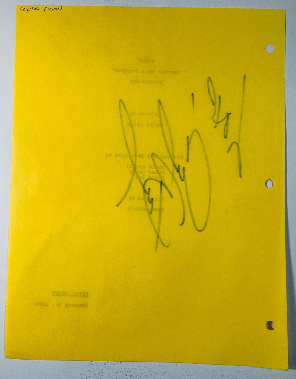 Reverse back view of the yellow script cover showing pencil attribution and ink bleed-through.