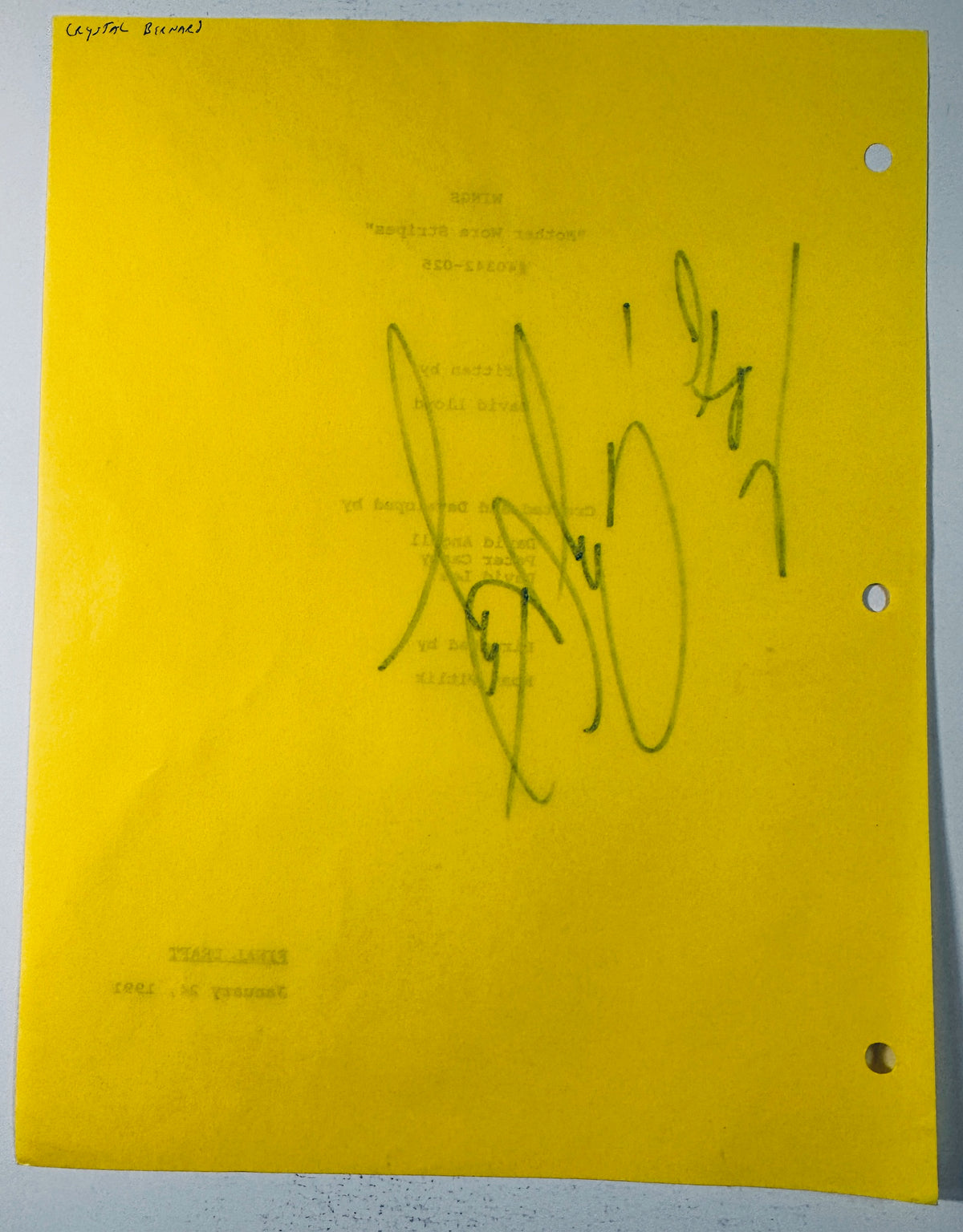 Reverse back view of the yellow script cover showing pencil attribution and ink bleed-through.