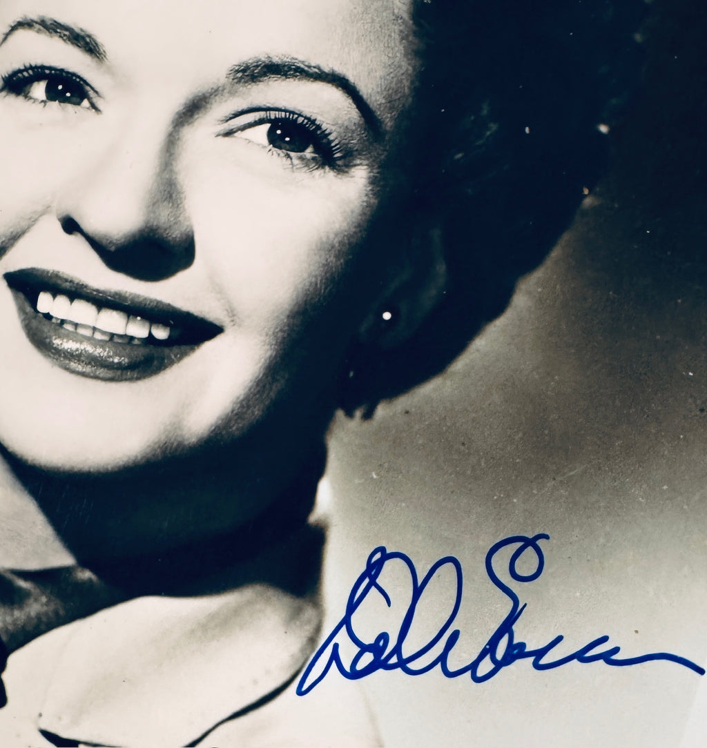 Close up detail of authentic Dale Evans autograph signed in blue ink on vintage 8x10 photo