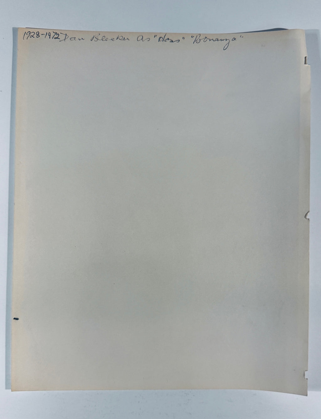 Reverse back view of vintage Dan Blocker autographed photo showing pencil notation and paper condition.