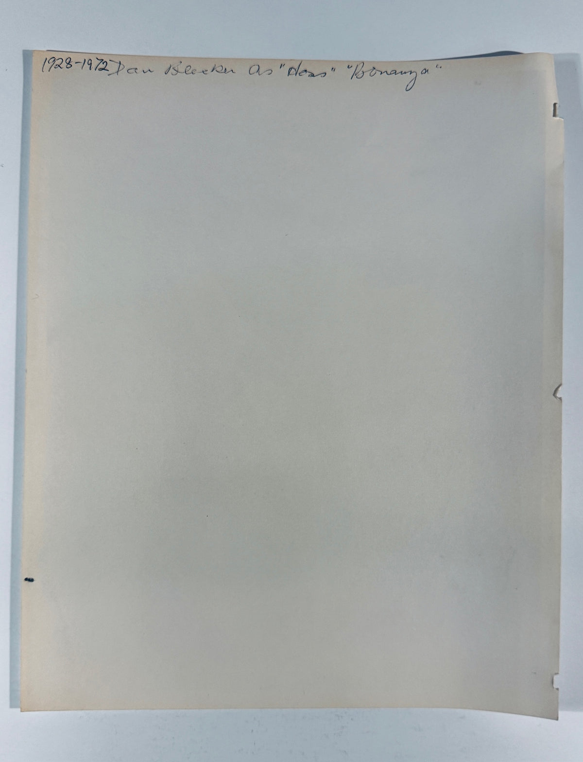 Reverse back view of vintage Dan Blocker autographed photo showing pencil notation and paper condition.