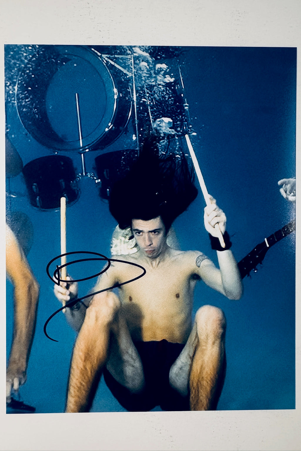 Dave Grohl hand-signed 8x10 matte photo playing drums underwater in the iconic Nirvana style.