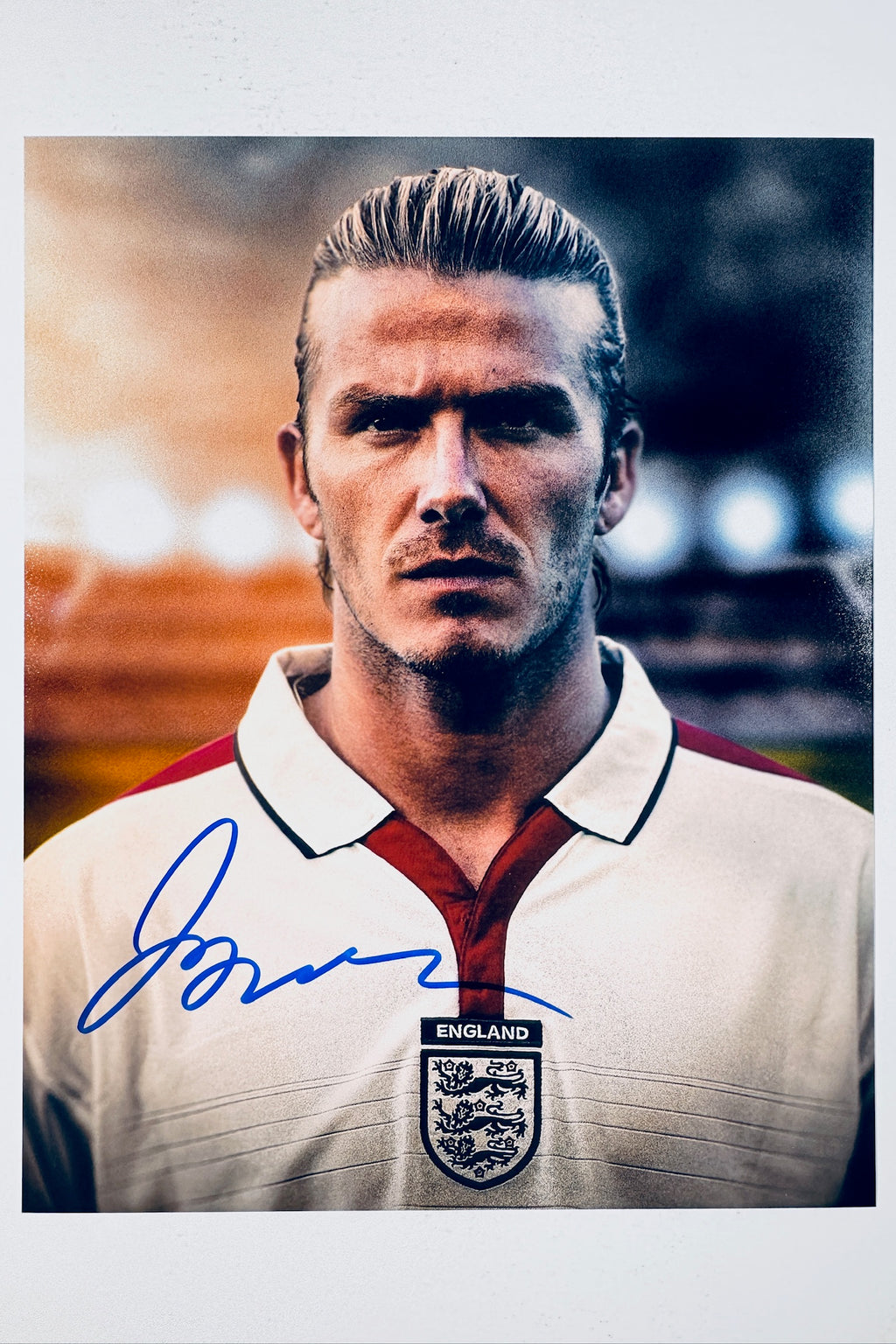 David Beckham hand-signed 8x10 matte photo wearing the England national team jersey.
