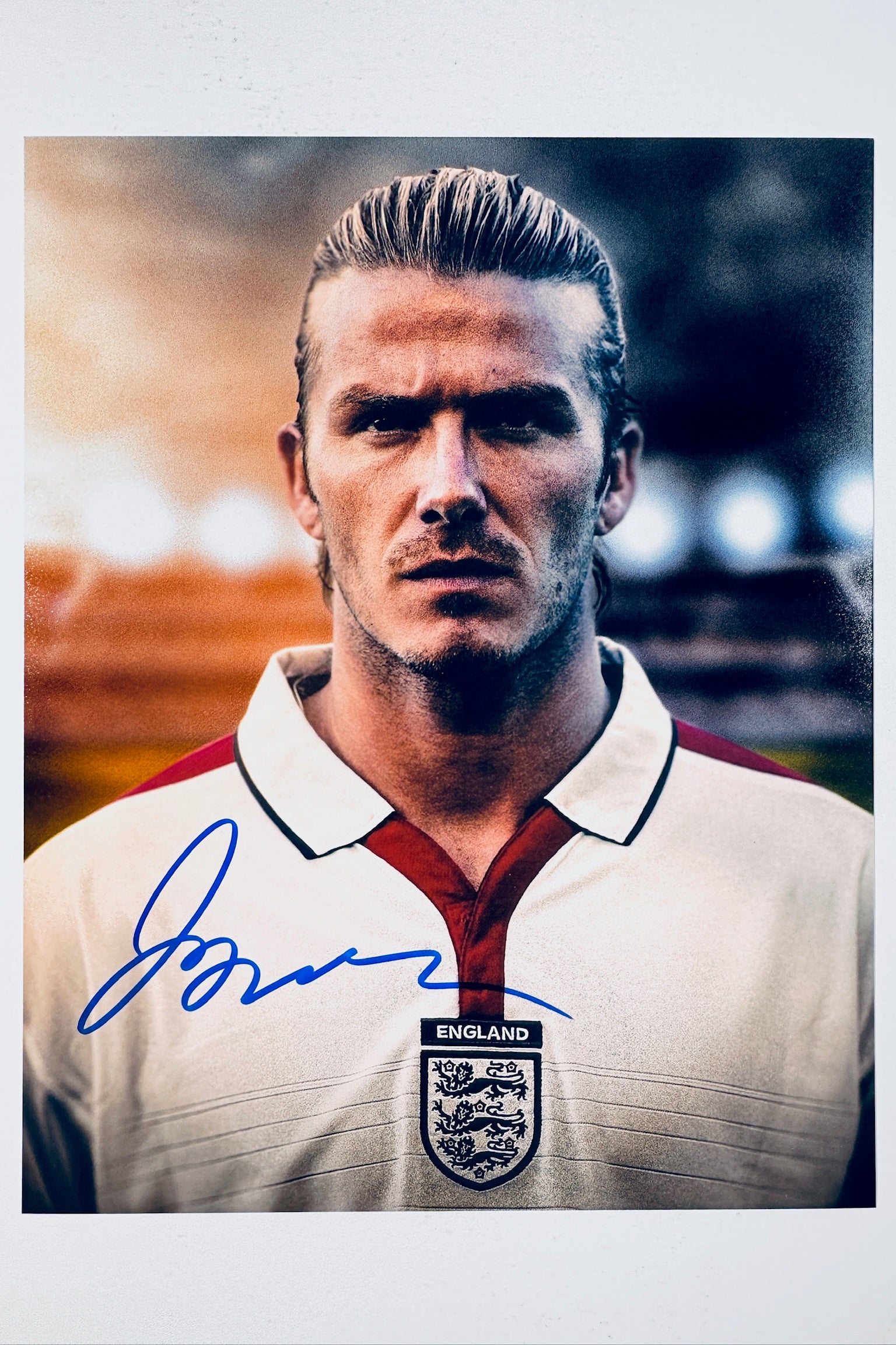 David Beckham hand-signed 8x10 matte photo wearing the England national team jersey.