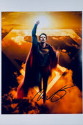 David Corenswet hand-signed 8x10 matte photo featuring Superman with his fist raised in front of a glowing sunset background from the DC Studios film directed by James Gunn.