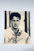 Autographed 8x10 photograph signed by Dustin Hoffman as Louis Dega in the 1973 film Papillon in black ink.