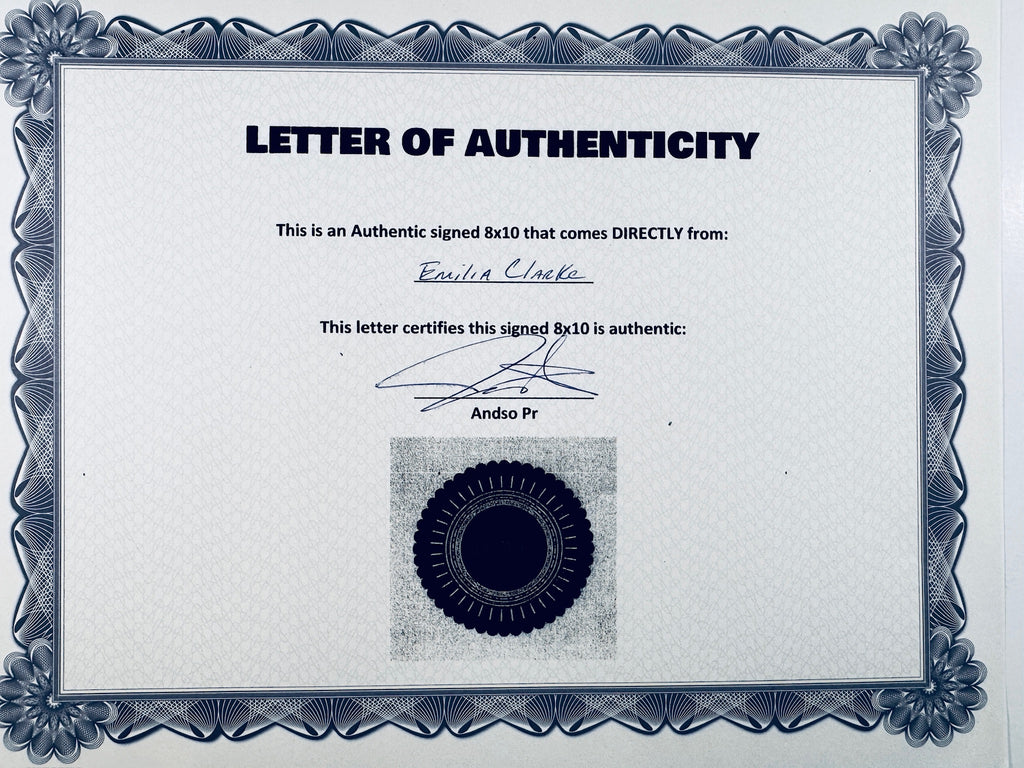A Letter of Authenticity certificate featuring a decorative blue patterned border, text certifying an authentic signed 8x10 from Emilia Clarke, a signature, and a dark circular seal graphic at the bottom center.