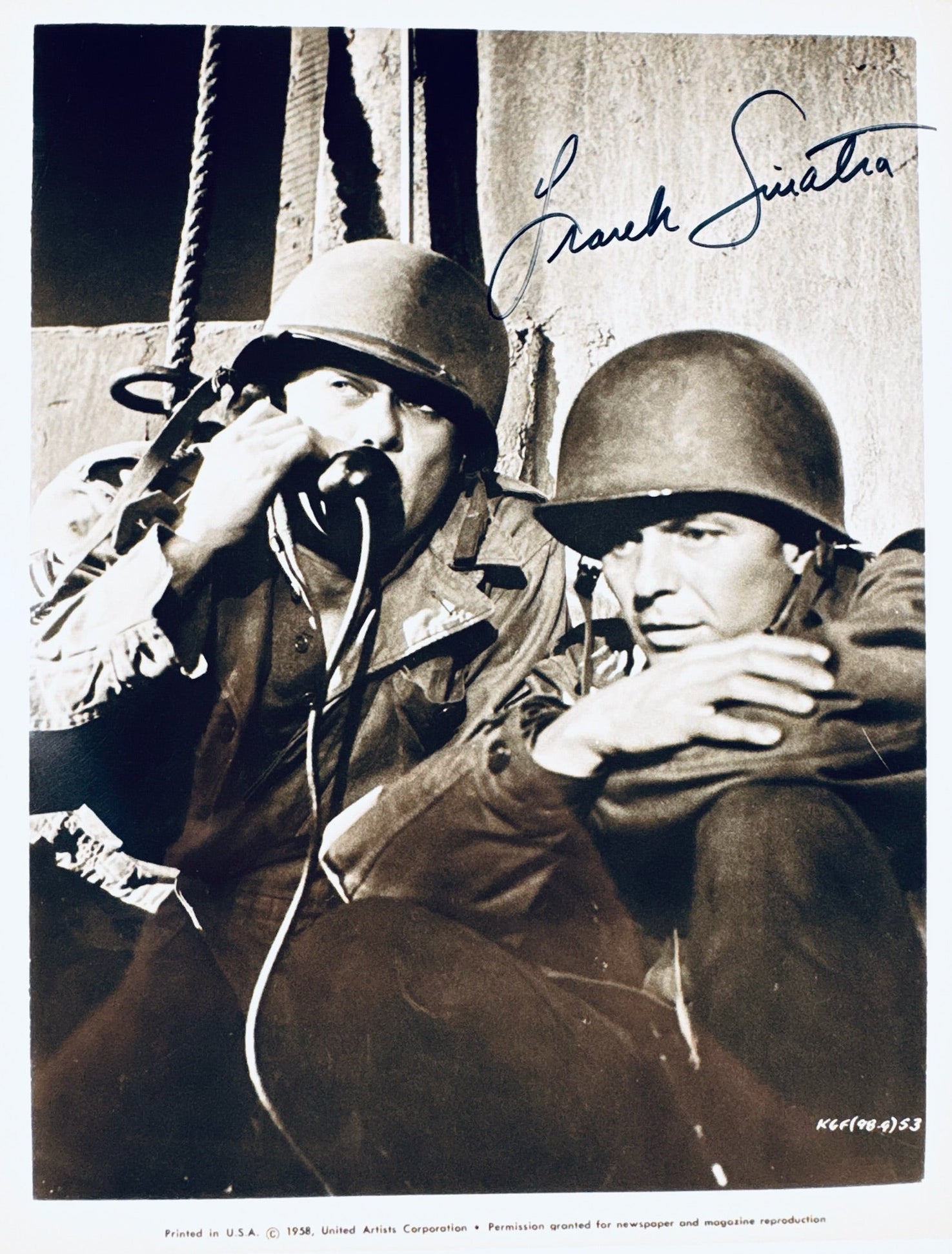 A professional 8x10 vintage black and white photograph featuring an authentic autograph by Frank Sinatra from the film Kings Go Forth.