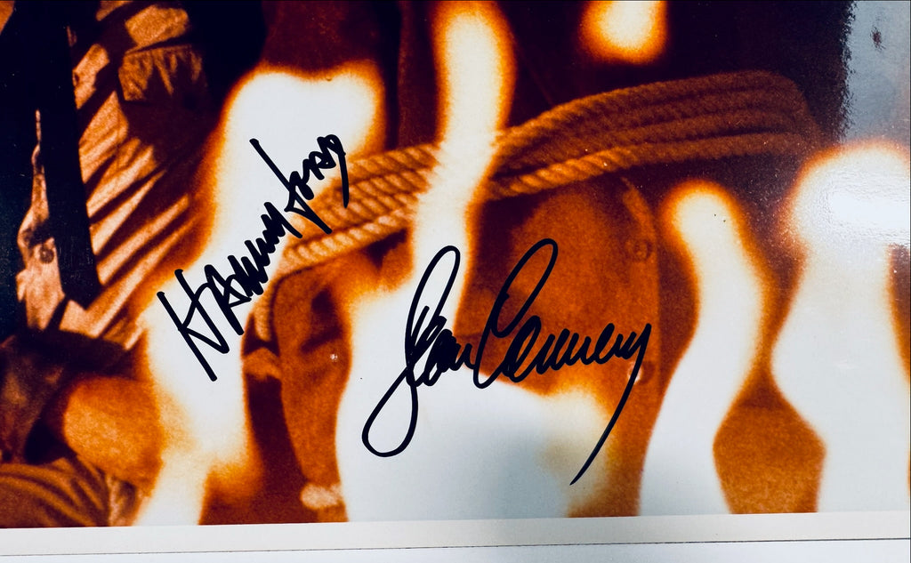 Closeup of Harrison Ford and Sean Connery autographs on Indiana Jones signed 8x10 photo