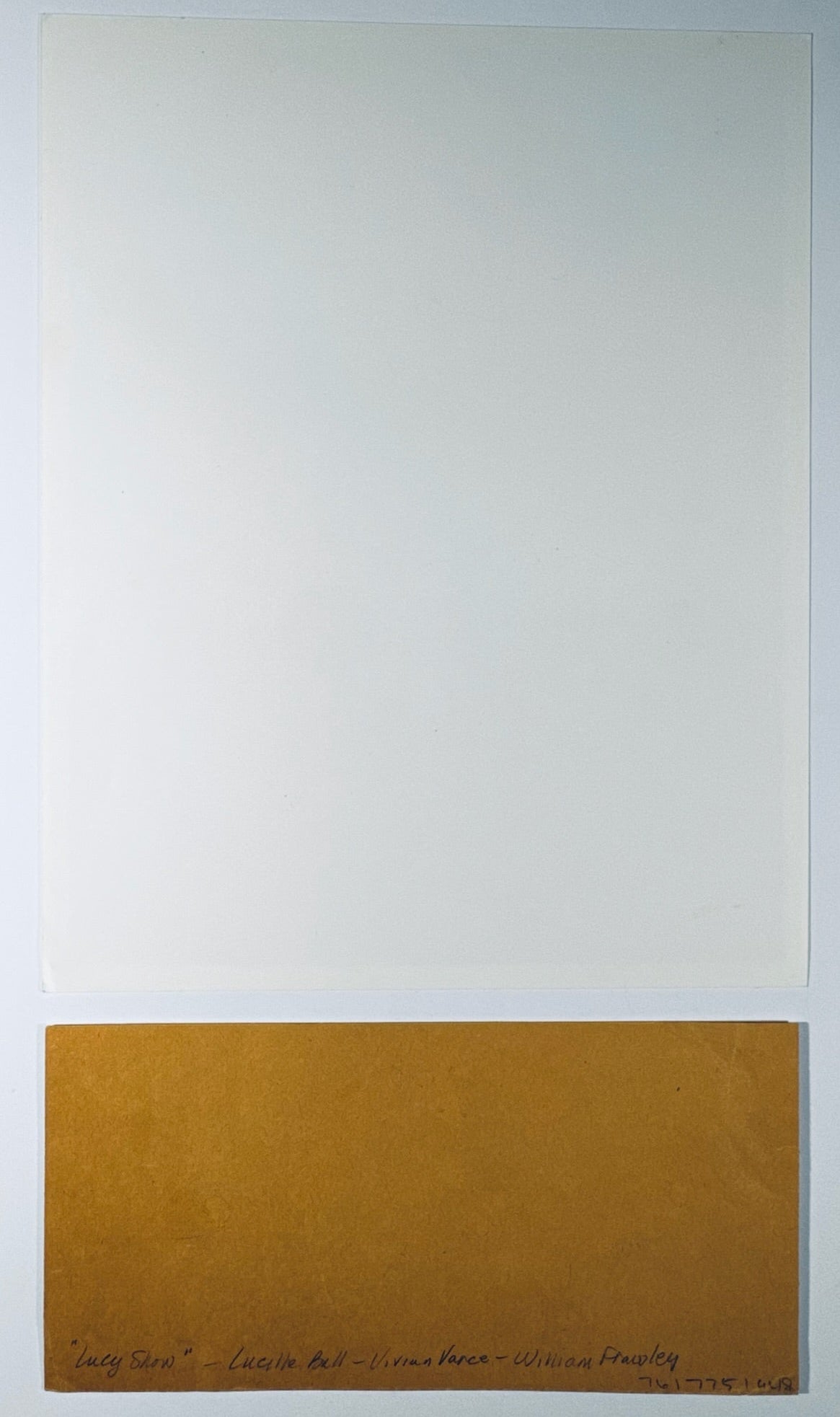 A combined view showing the back of the vintage 8x10 photograph alongside the vintage paper with three cast autographs.
