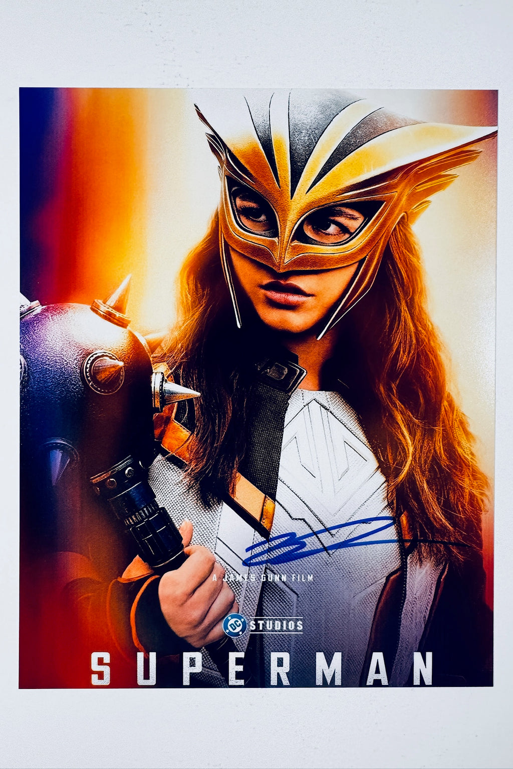 Signed full photo of Isabela Merced as Hawkgirl in Superman, featuring a blue autograph.