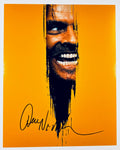 A professional 8x10 matte photograph featuring an authentic autograph by film legend Jack Nicholson.