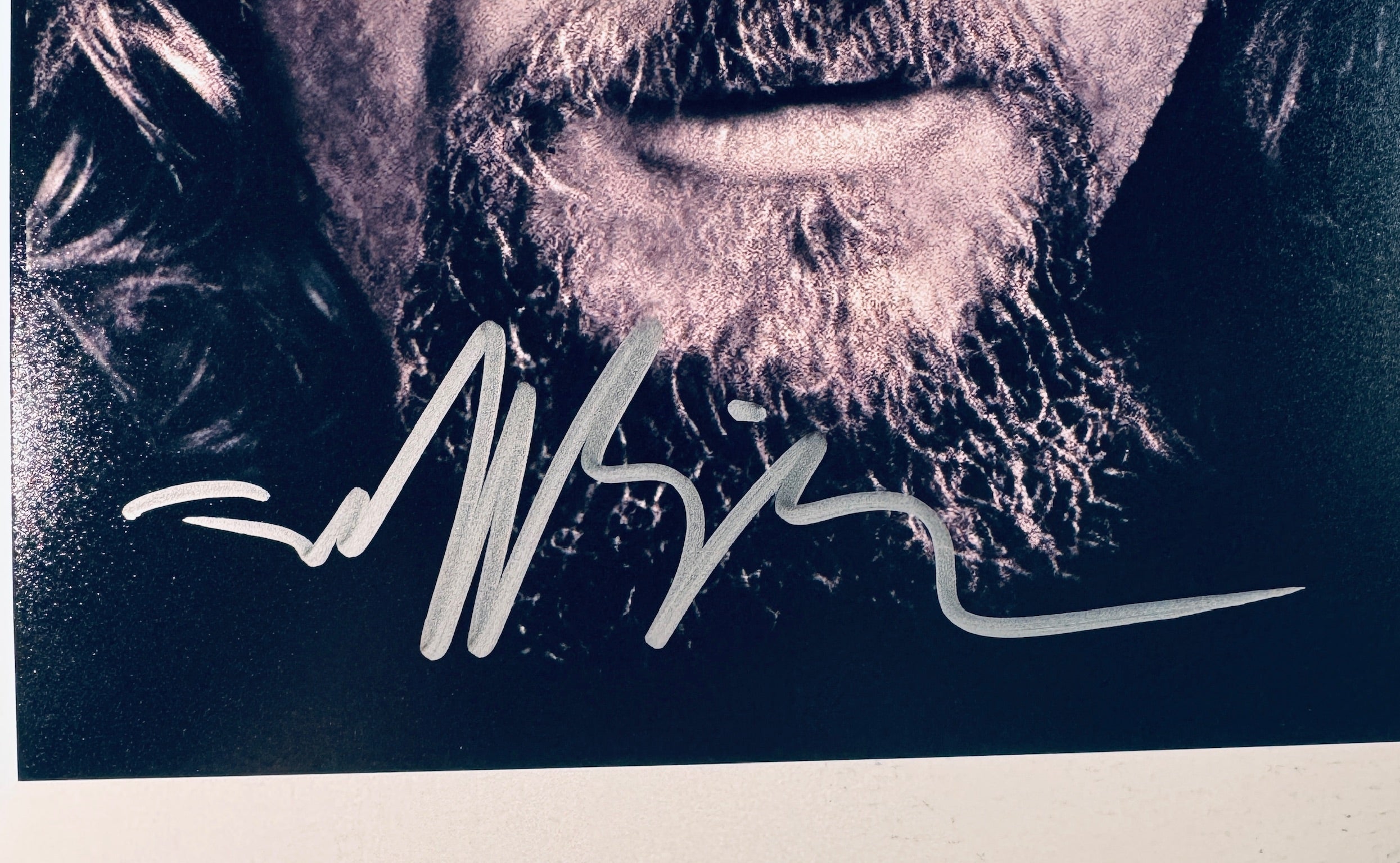Close-up of Jeff Bridges's signature in silver marker on the signed The Big Lebowski 8x10 photo.