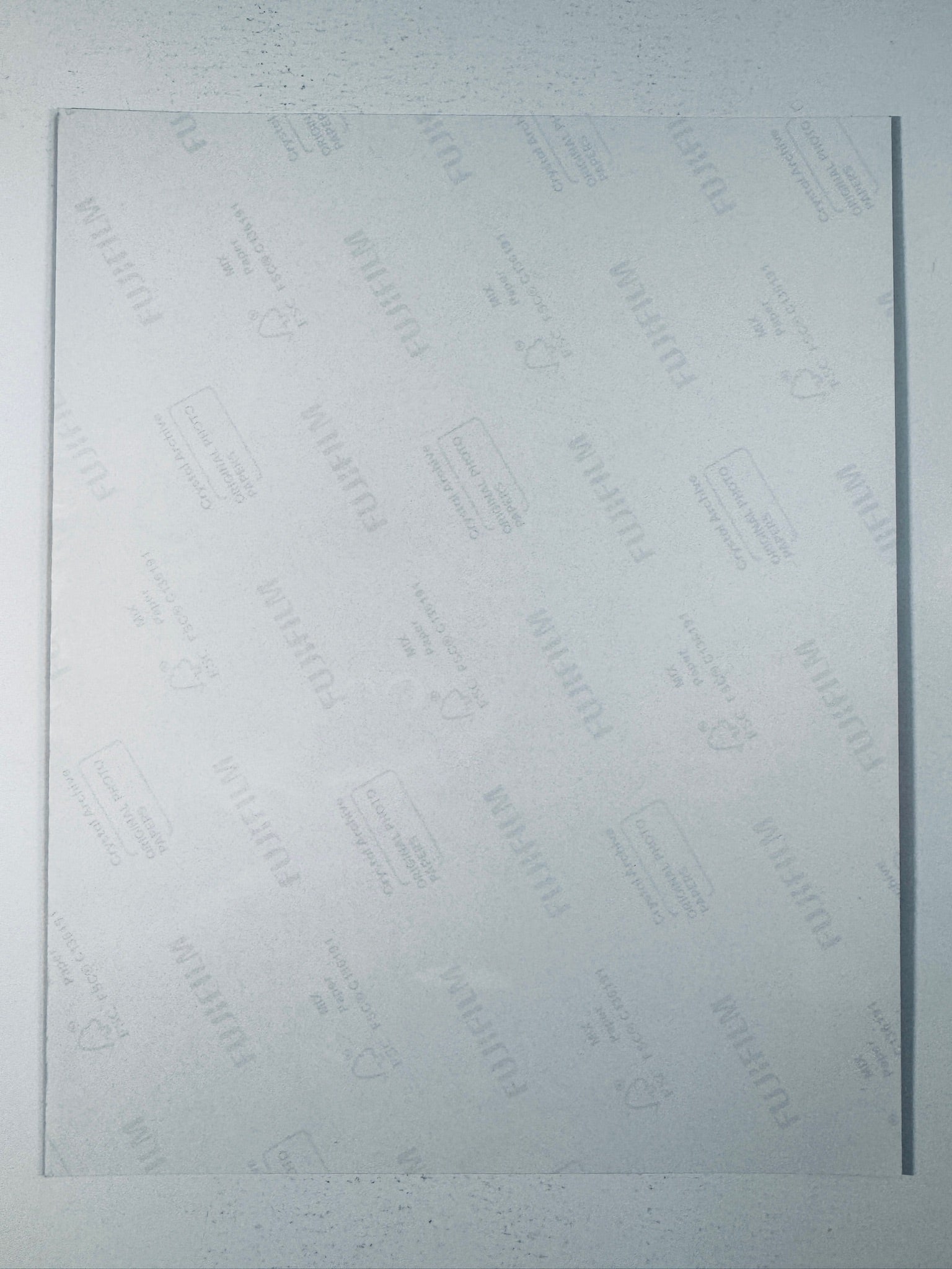 Fujifilm Crystal Archive photographic paper back surface showing the authentic backing and matte paper texture for the Jeff Dunham signed photo.