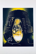 An illustrative, stylized art print depicting a human figure trapped inside a glowing telepod capsule with ribbed machine elements in the background, featuring a grey/silver autograph signed across the lower left area.