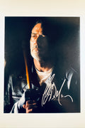 A portrait of Jeffrey Dean Morgan as Negan from The Walking Dead holding his bat Lucille, featuring a signature in white/silver ink on the lower right.