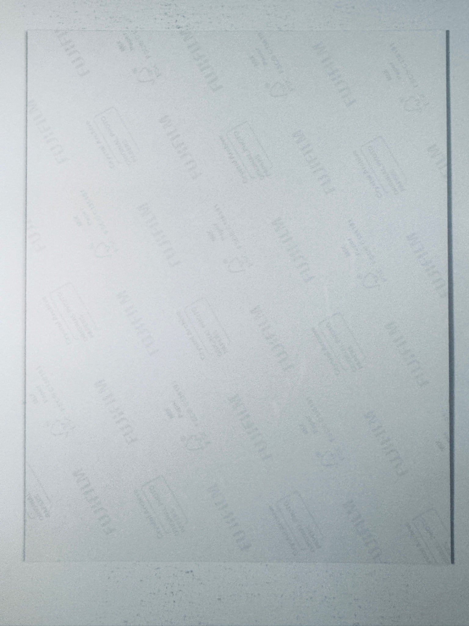 Fujifilm Crystal Archive photographic paper back surface showing the authentic backing and matte paper texture for the Jeremy Renner signed photo.