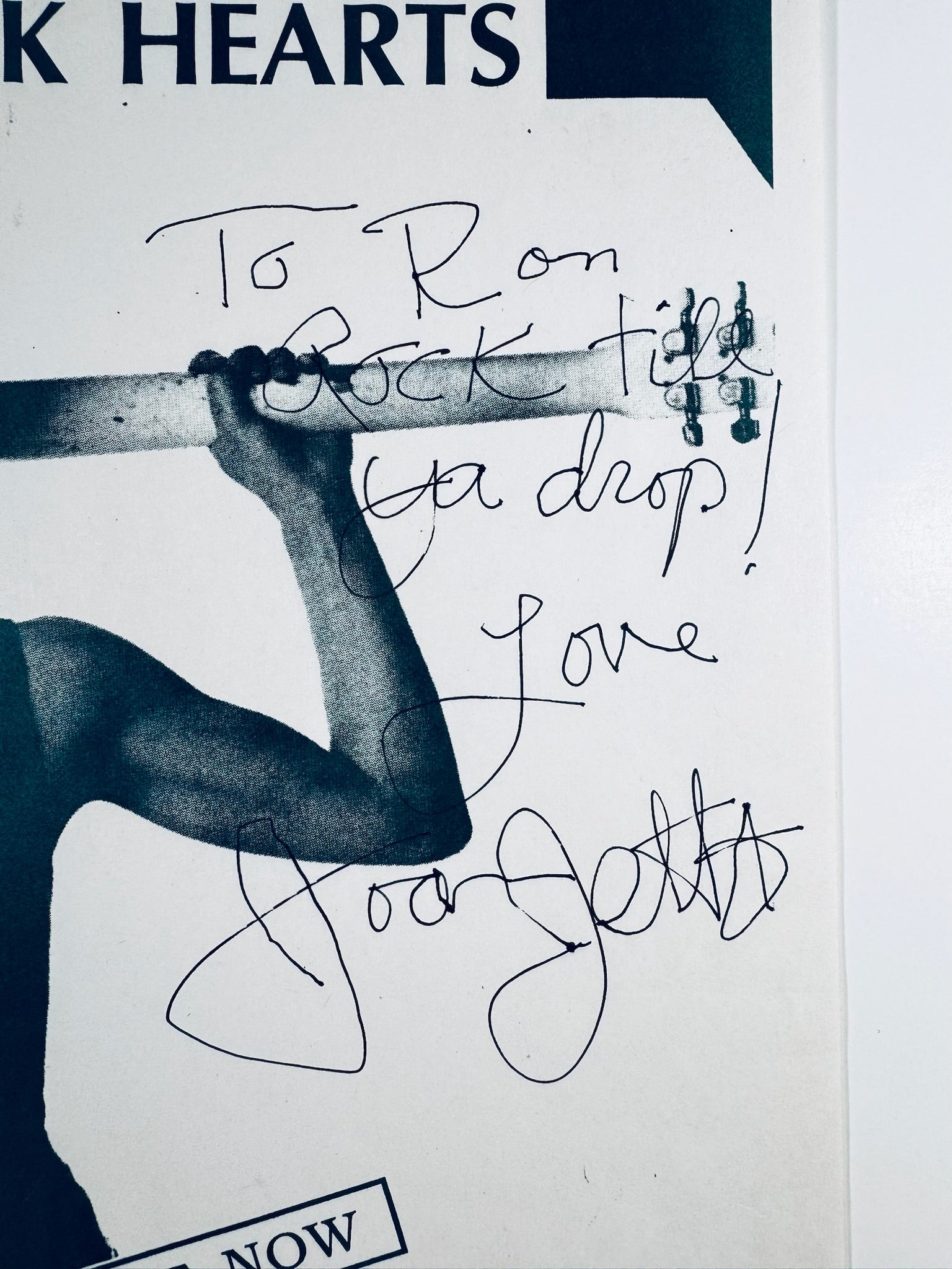 Closeup of Joan Jett autograph on original 8.5x11 concert promotional poster