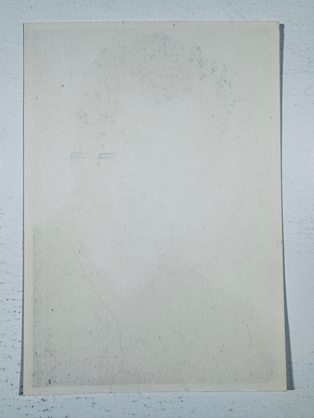 Blank reverse back side of the John Travolta autographed promotional portrait photo.