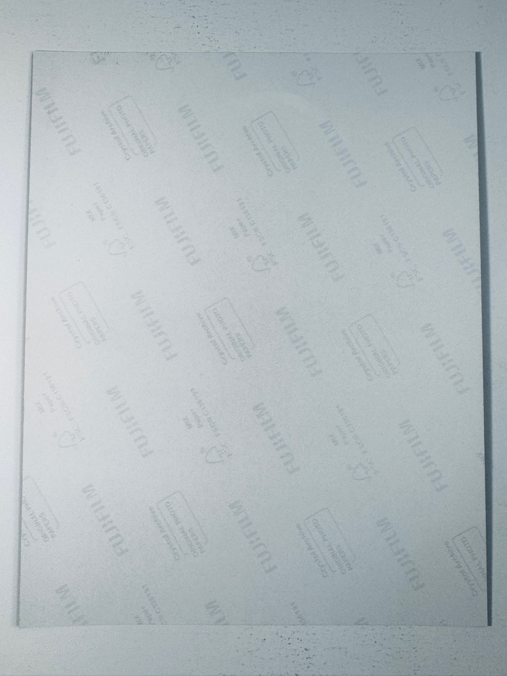 Fujifilm Crystal Archive photographic paper back surface showing the authentic backing and matte paper texture for the John Williams signed photo.