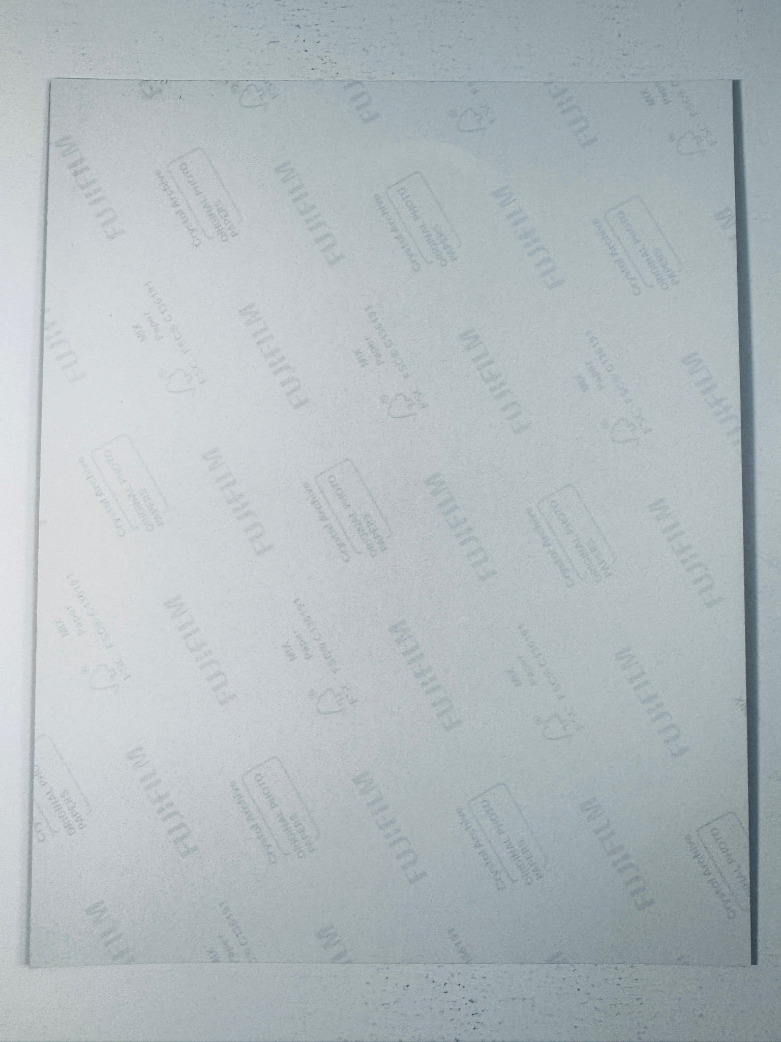 Fujifilm Crystal Archive photographic paper back surface showing the authentic backing and matte paper texture for the John Williams signed photo.