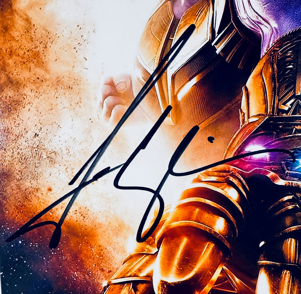 Close-up of Josh Brolin's signature in black marker on the Thanos signed 8x10 photo.