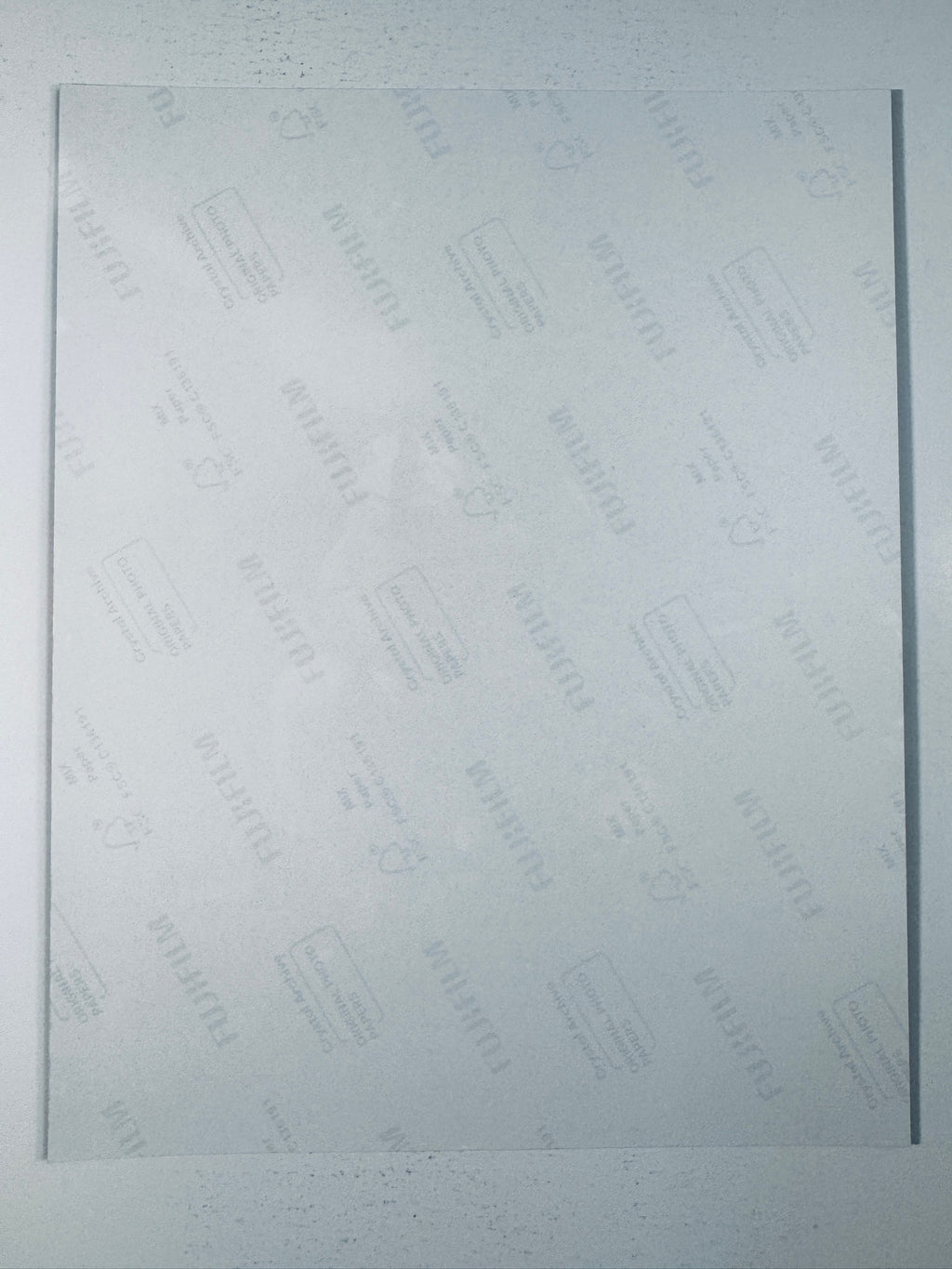 Fujifilm Crystal Archive photographic paper back surface showing the authentic backing and matte paper texture for the Julian Edelman signed photo.