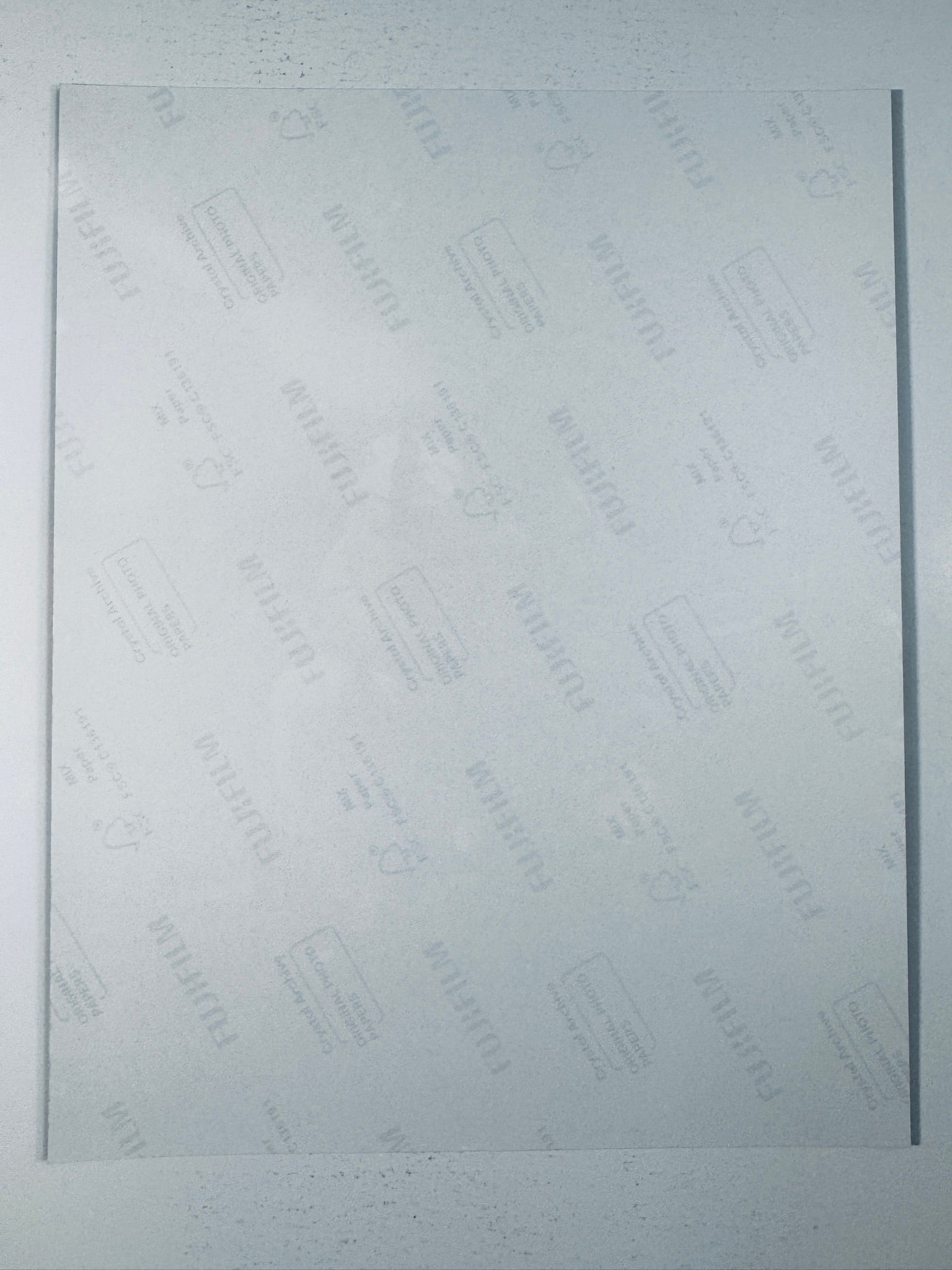 Fujifilm Crystal Archive photographic paper back surface showing the authentic backing and matte paper texture for the Julian Edelman signed photo.