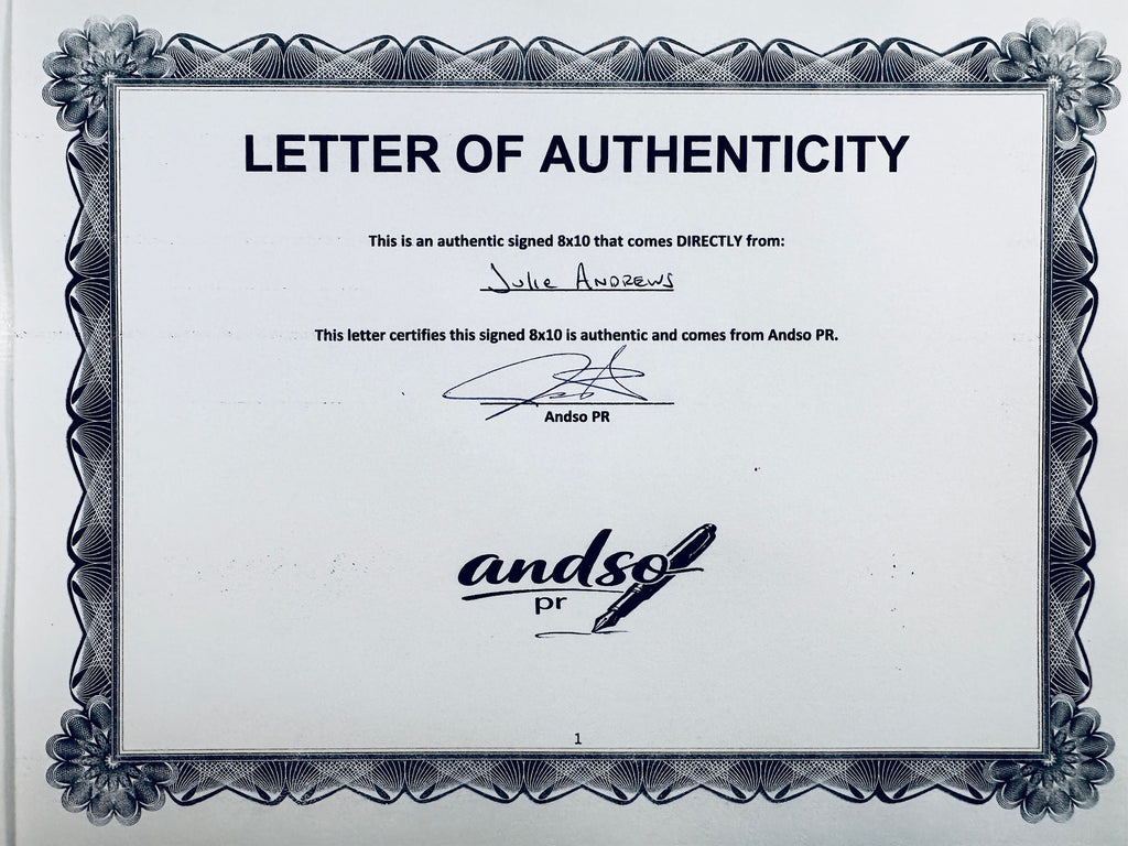 A Letter of Authenticity with a decorative blue-patterned border, certifying an authentic signed 8x10 coming directly from Julie Andrews, featuring a signature at the top.