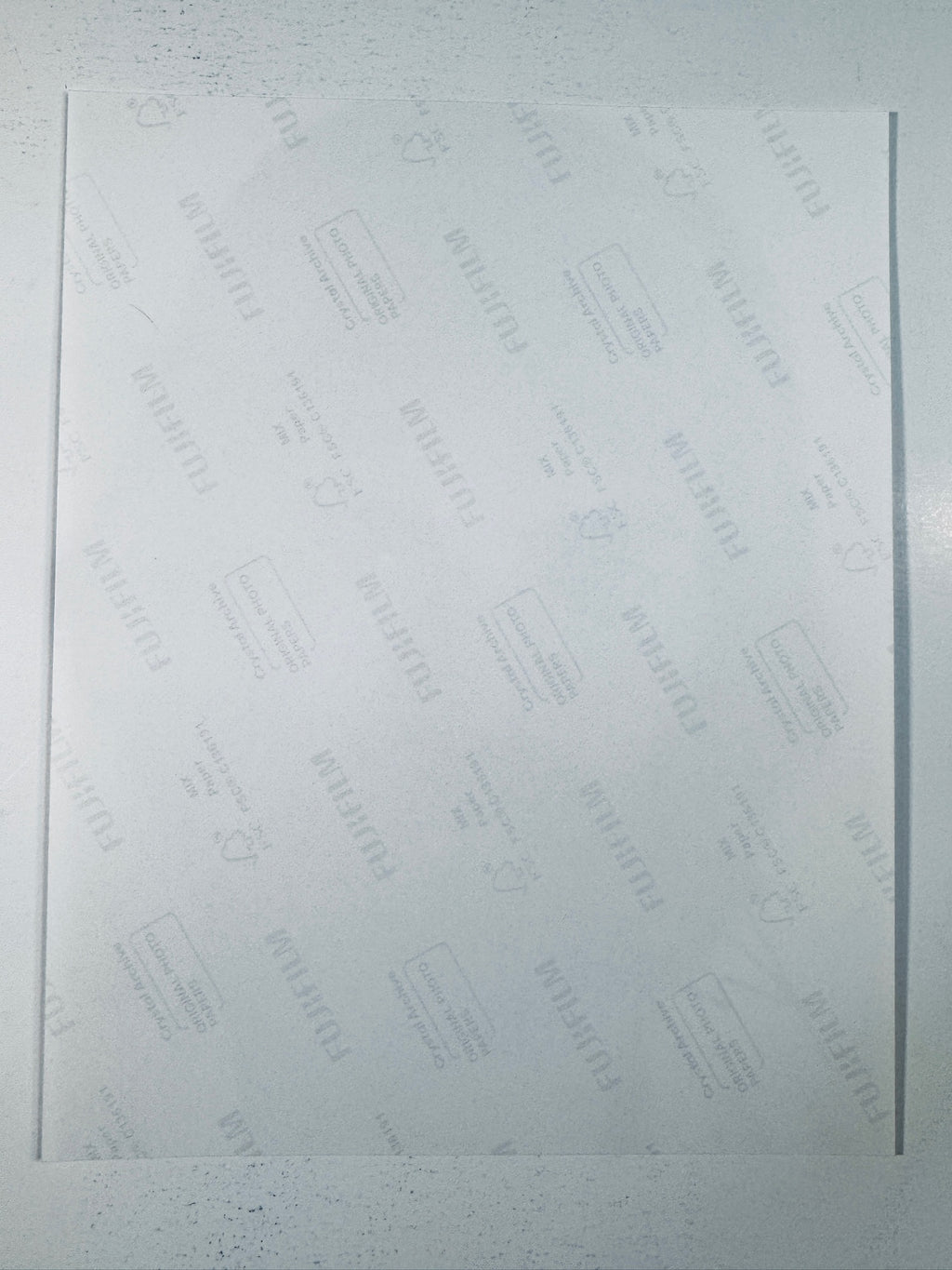 Fujifilm Crystal Archive photographic paper back surface showing the authentic backing and matte paper texture for the vintage bearded Kenny Loggins signed photo.